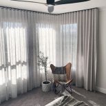Curtains meet in corner